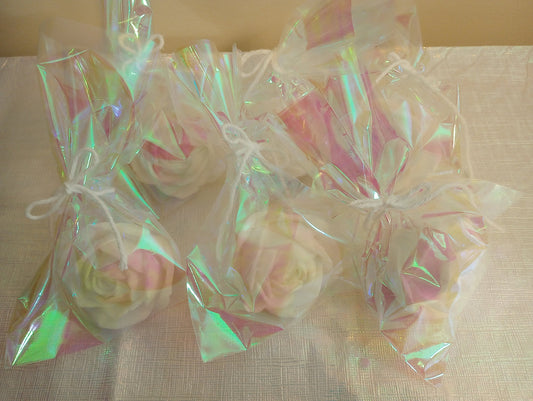 Handmade rose soap favors with unique recipe labels tags and iridescent packaging.